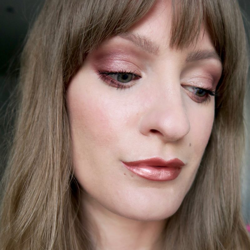 Rose gold lipstick, smokey eye, long fringe (Glowy make up edit)